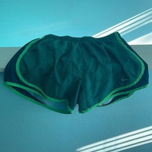 Green Nike running shorts size medium